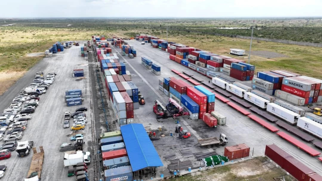 Crane lifting a shipping container at an inland depot